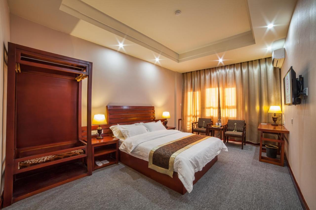Hotel Shanghai City Osh Exterior photo