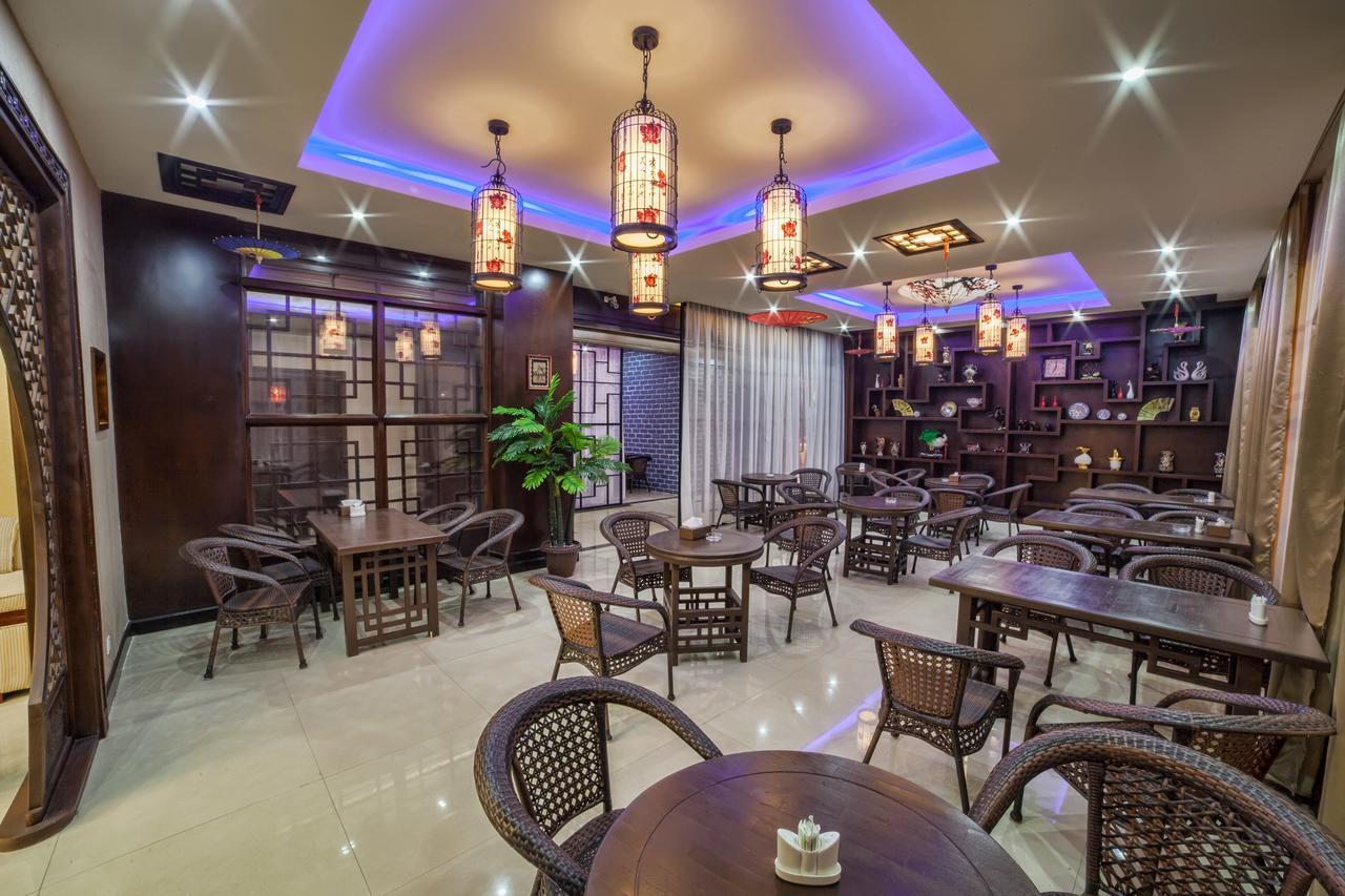 Hotel Shanghai City Osh Exterior photo