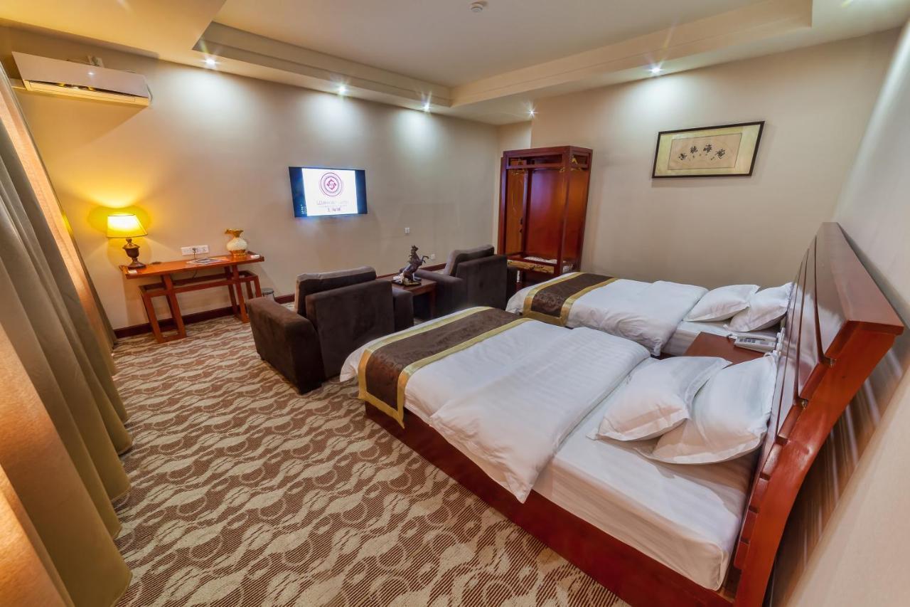 Hotel Shanghai City Osh Exterior photo